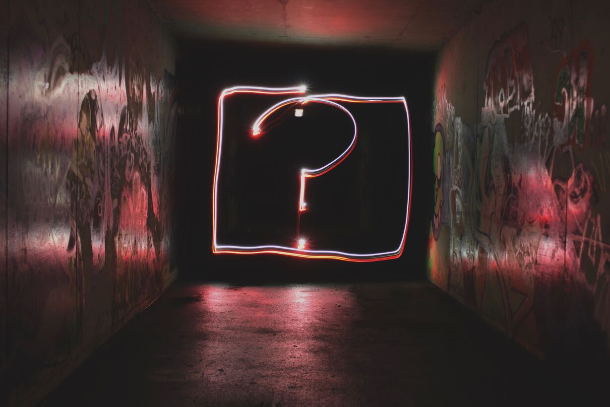 Neon question mark (photo by Emily Mortimer on Unsplash)